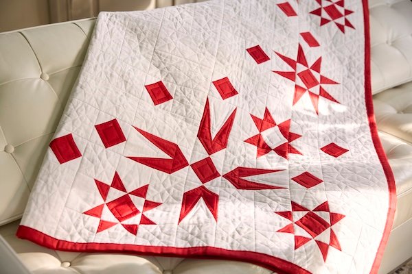 Scandinavian Christmas Quilt: An Embroidered Masterpiece